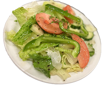 plate of green lettuce, sliced tomatoes wedges, sliced cucumbers and slice green peppers with a homemade Vinaigrette dressing