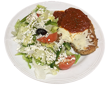 half the plate has a breaded chicken cutlet topped with cheese and homemade tomato sauce, the other half has a greek salad with sliced tomato wedges, sliced onion, sliced cucumbers, on top of a green lettuce, with black olives, feta cheese and topped with homemade Greek Dressing